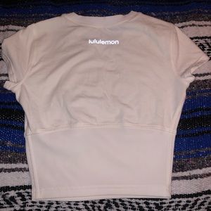 White Lululemon “New Ambition” crop top